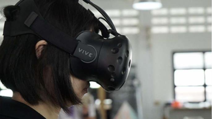 A person wearing a Vive VR headset